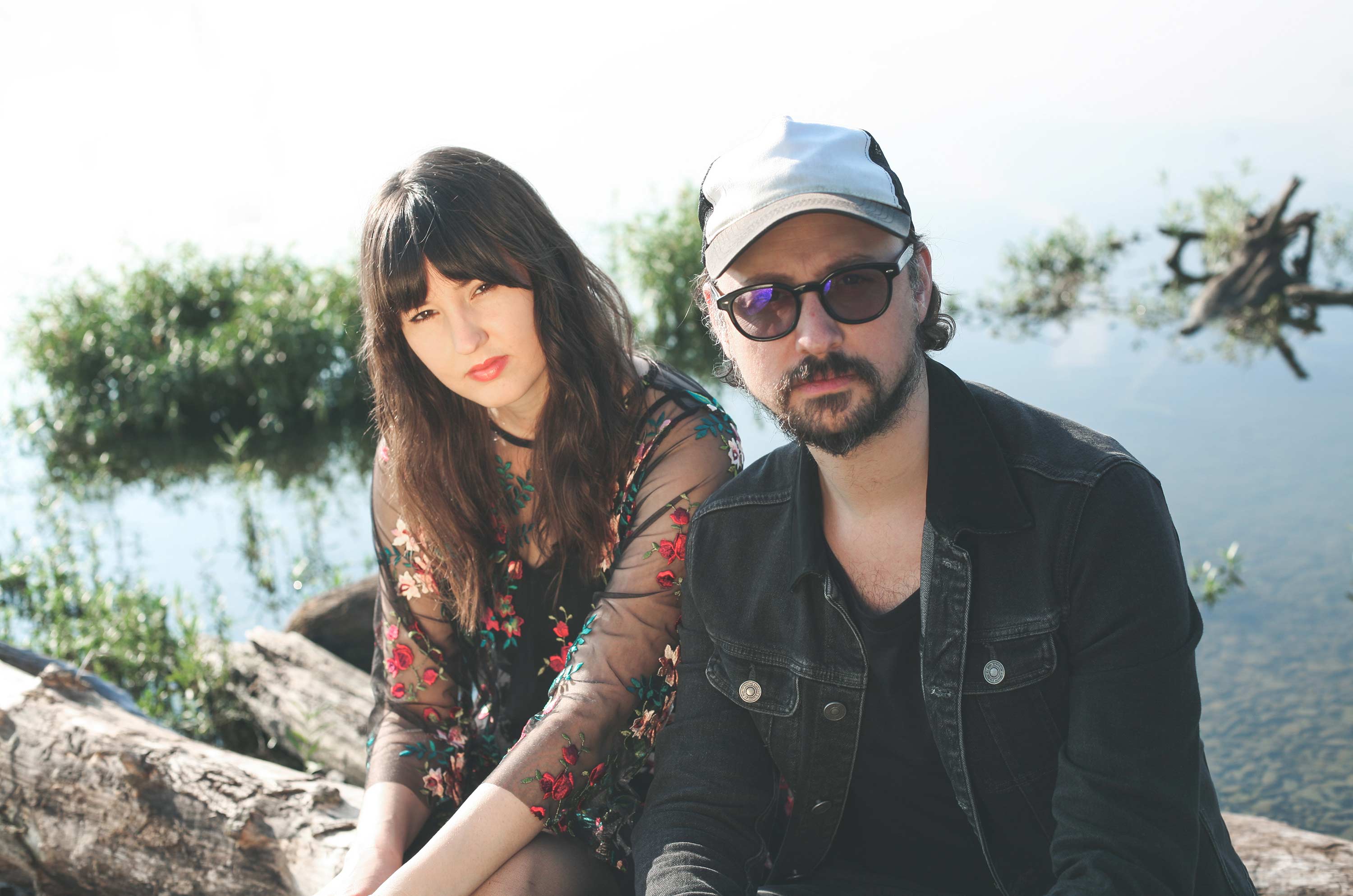 John Grímsey and Rebecca Hamer by the lake